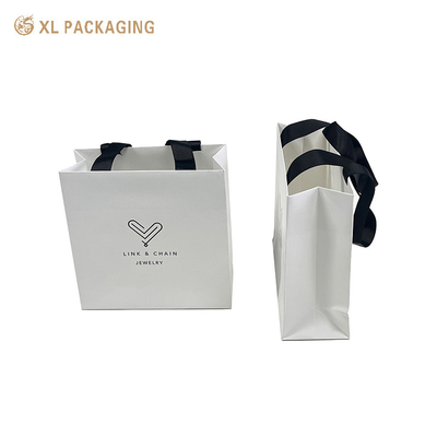 acheter Sac de papier d'impression de luxe sur mesure Sac cadeau de papier d'emballage Sac de papier avec le logo personnalisé Package de tissu Sac d'expédition online manufacture