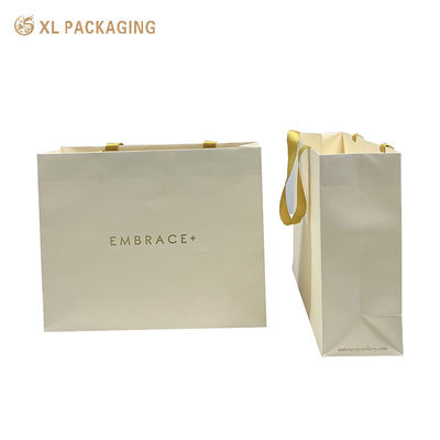 acheter Sacs en papier écologiques personnalisés pour vêtements et emballages cadeaux fabrication en ligne