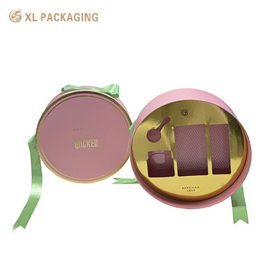 acheter Boîte cadeau cosmétique ronde personnalisée en deux parties avec couvercle et base, boîte rigide rose nude avec dorure à chaud et ruban de satin vert et insert en PET fabrication en ligne