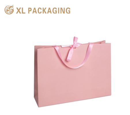 acheter Sac cadeau en papier de luxe rose boutique Sac d'emballage en carton 250G Gsm Avec votre propre logo online manufacture