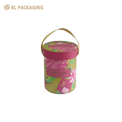 Boîte cadeau personnalisée ronde en tube de papier avec carton rigide de 2 mm, impression CMJN 4 couleurs et poignée en ruban de satin doré