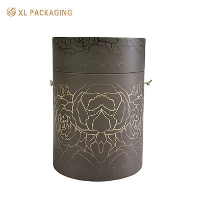 Emballage de tubes de papier à manche de corde portable avec 157 grammes de papier d'art et impression de luxe personnalisable pour les cadeaux haut de gamme