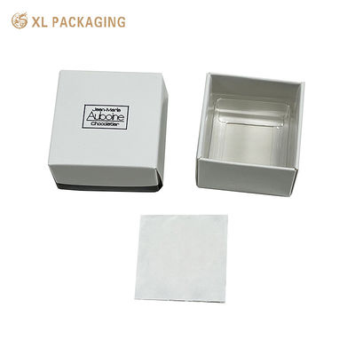 Boîte de chocolat en relief blanc de luxe avec plateau en PET - Boîte cadeau à bonbons pliable à deux pièces avec timbre en papier noir