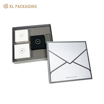 Boîte cadeau personnalisée rigide haut et bas de luxe avec insert de velours pour les ensembles de soins de la peau