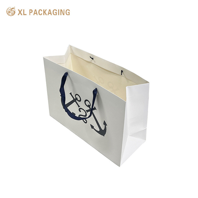 Sacs d'emballage en papier blanc en feuille d'or en papier kraft vêtements chaussures sac de magasin avec poignée