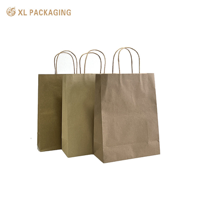 Sacs cadeaux en papier imprimé Sacs de papier recyclé Sacs de papier Kraft Papier de haute qualité Vêtements cosmétiques Boîte en papier avec logo