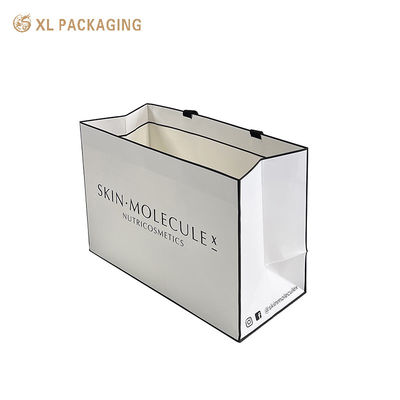 Logo personnalisé Sac de papier cosmétique de luxe avec 350 grammes de carton blanc, stratification mate et poignées de coton