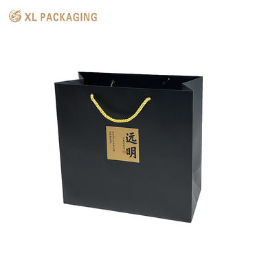 Sac shopping noir personnalisé en papier pour emballage de vêtements et de vin