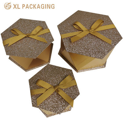 Boîte cadeau rigide hexagonale personnalisée pour chocolats avec carton de 1,5 mm et papier spécial pailleté doré pour emballage de la Saint-Valentin