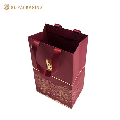 Sac cadeau de luxe écologique haut de gamme avec estampage en feuille d'or et poignées de ruban renforcé pour emballage personnalisé